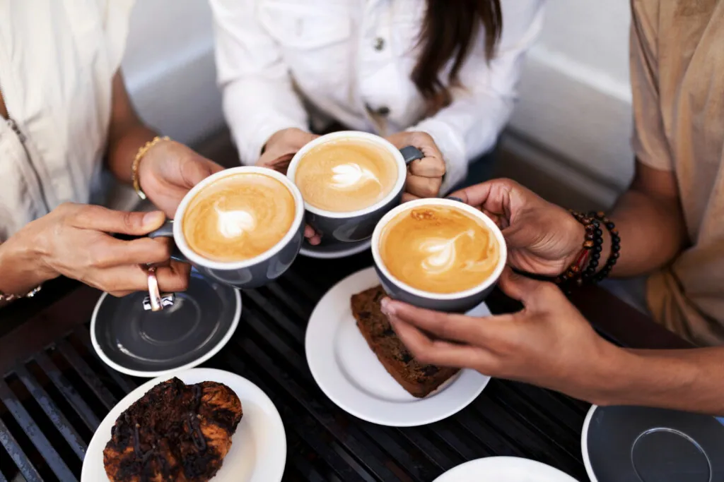 Guests queuing for coffee at an event