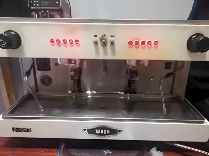 Wega Pegaso two-group commercial coffee machine in for repair